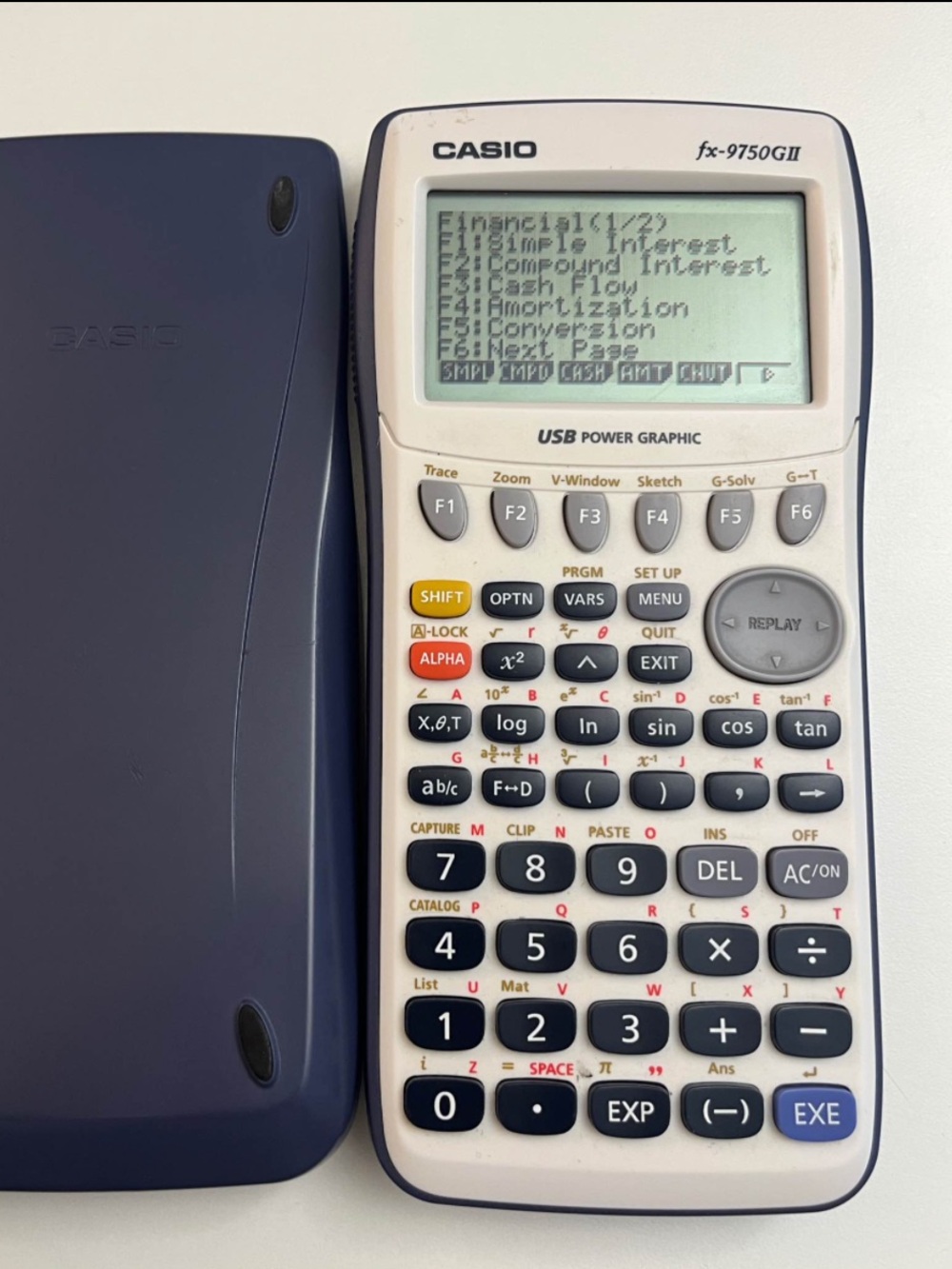 Casio fx-9750GII Graphing Calculator in White and Dark Blue